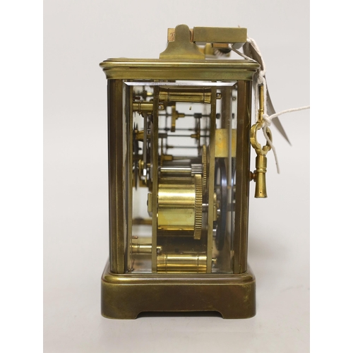 1408 - A French brass repeating carriage clock, 15cm