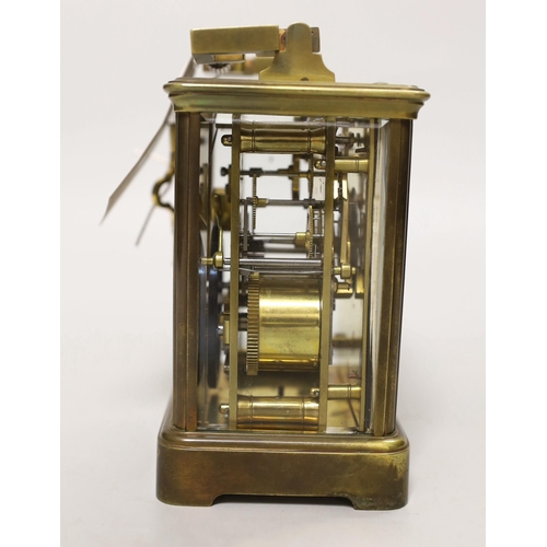 1408 - A French brass repeating carriage clock, 15cm