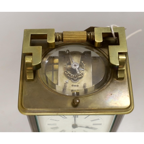 1408 - A French brass repeating carriage clock, 15cm