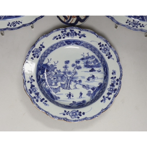 1410 - Three 18th century Chinese blue and white plates and an Imari flared vase, 22cm