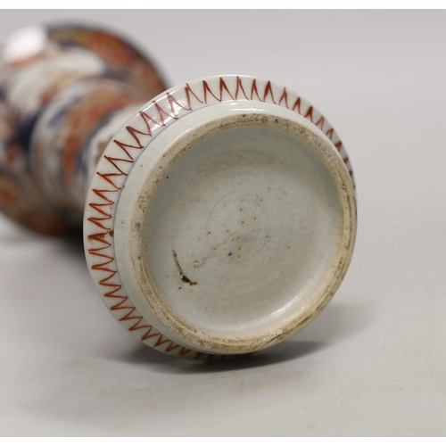 1410 - Three 18th century Chinese blue and white plates and an Imari flared vase, 22cm