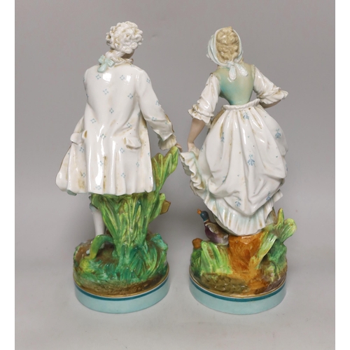 1411 - A pair of large French porcelain figures, late 19th century, 33cm tall