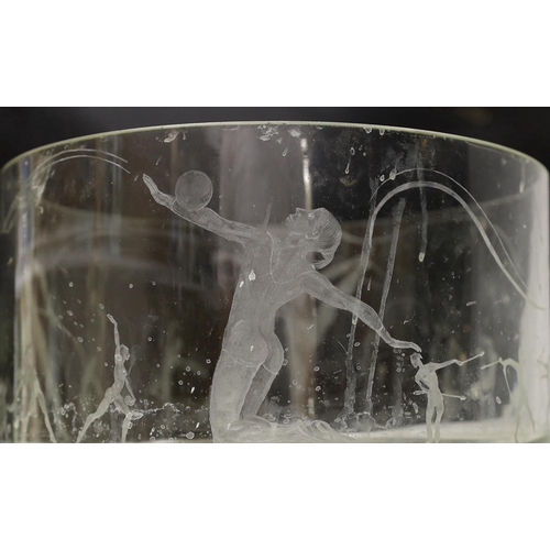 1412 - A large glass bowl engraved with artistic gymnastic scenes, 30cm diameter