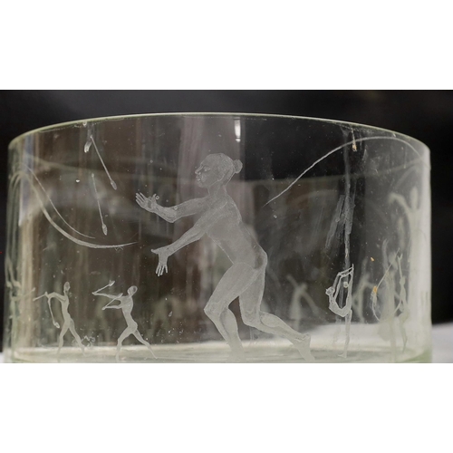 1412 - A large glass bowl engraved with artistic gymnastic scenes, 30cm diameter