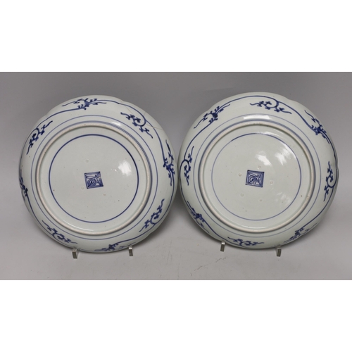 1429 - Three Japanese blue and white Arita dishes, largest 25cm