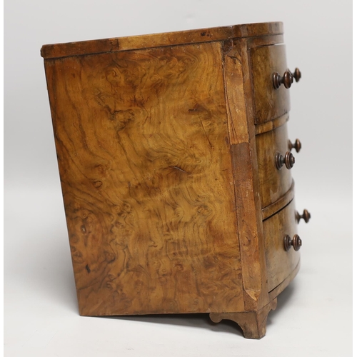 1433 - A Victorian miniature burr walnut bow fronted chest and a beech jewellery box, chest 29cm