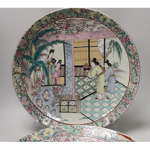 1445 - A pair of Japanese famille rose chargers and an Imari charger, largest 40.5cm diameter