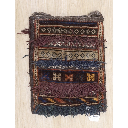 1448 - A Caucasian salt carpet bag with tasseling, 38cm x 48cm