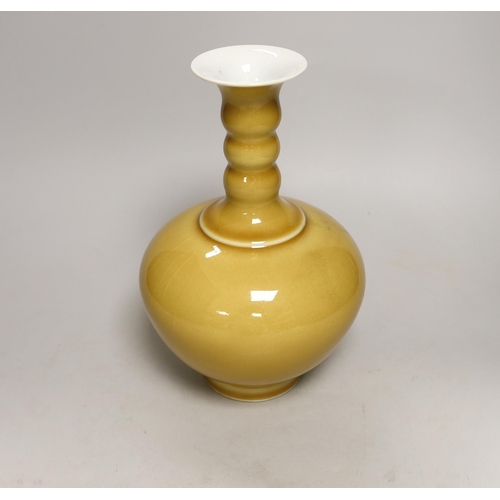 1451 - A Chinese yellow ground bottle vase, 25cm high