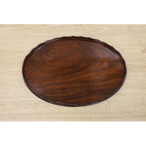 1477 - A George III mahogany oval galleried tray, 65cm wide