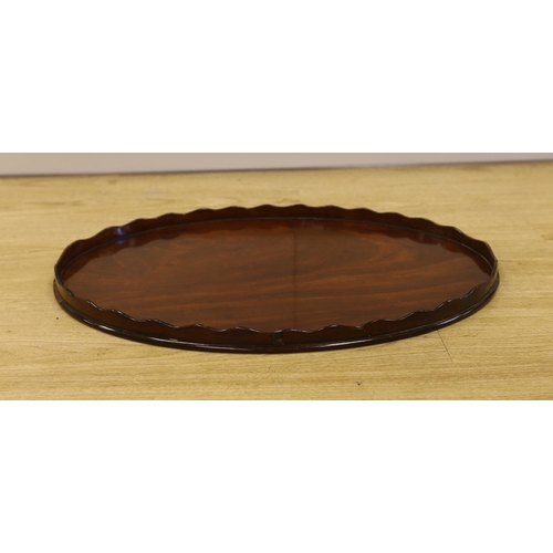 1477 - A George III mahogany oval galleried tray, 65cm wide