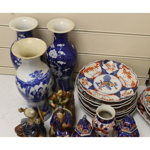 1492 - A collection of Chinese and Japanese pottery and porcelain including three vases, five figures, plat... 