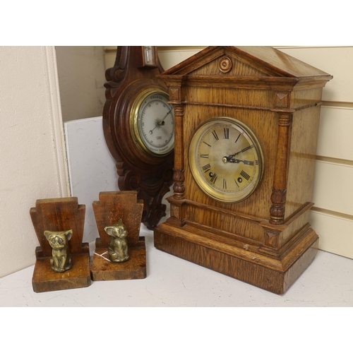 1493 - Woodenware including Art Deco bookends, a Black Forest Winterhalder and Hofmeier clock striking on a... 