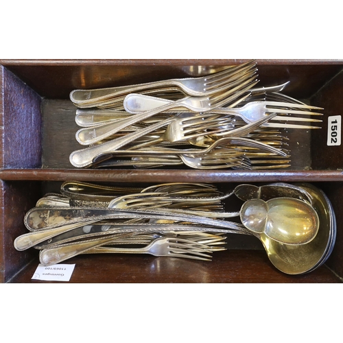 1502 - An Elkington & Co. plated canteen of cutlery, each piece engraved with a greyhound crest and two mah... 