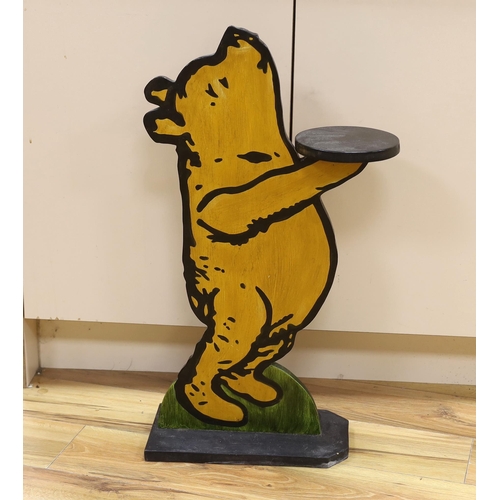 1524 - A Winnie the Pooh painted dumb waiter, 75cm high