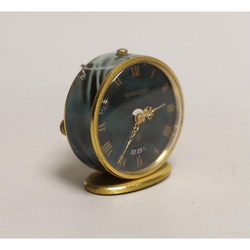 1530 - A Jaeger Le Coultre travelling alarm timepiece, 5cm