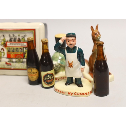 1538 - Six Carltonware Guinness advertising models, three related bottles and a rectangular box