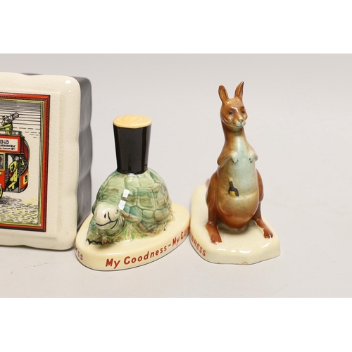 1538 - Six Carltonware Guinness advertising models, three related bottles and a rectangular box