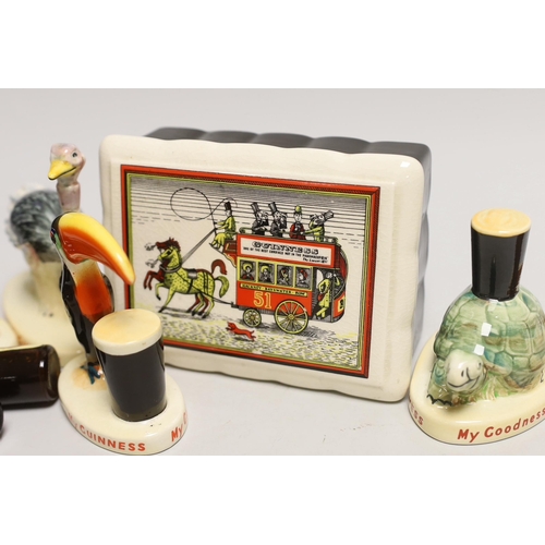 1538 - Six Carltonware Guinness advertising models, three related bottles and a rectangular box