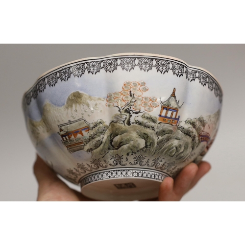 1553 - A Chinese eggshell bowl in fitted box, decorated with a mountainous landscape, 18cm in diameter... 