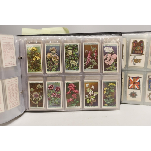 1554 - A collection of cigarette cards, some arranged in albums including Wills