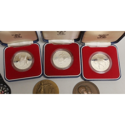 1559 - Three cased proof silver 1977 crowns, and various commemorative medals