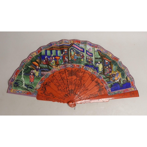 1561 - A Chinese hand painted figural fan with applied ivory faces and red lacquered guards, and boxed both... 