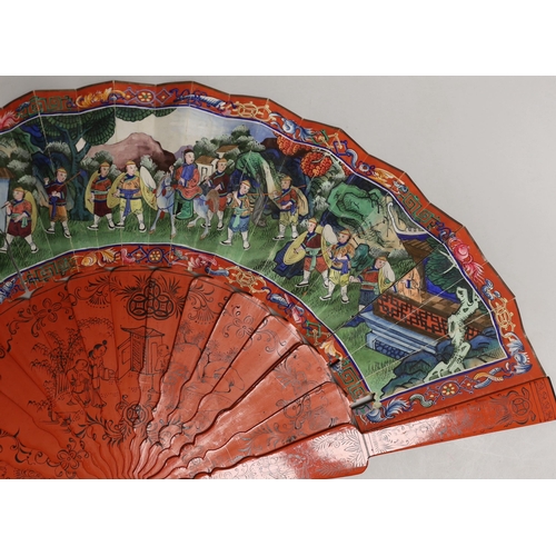 1561 - A Chinese hand painted figural fan with applied ivory faces and red lacquered guards, and boxed both... 