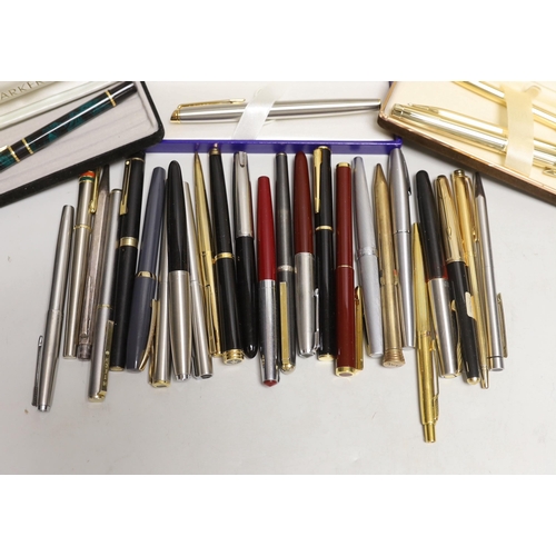 1567 - A group of fountain pens and ballpoint pens including a cased Sheaffer set