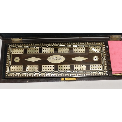 1569 - A mother of pearl inlaid rosewood cased cribbage set, with related letter, 1832