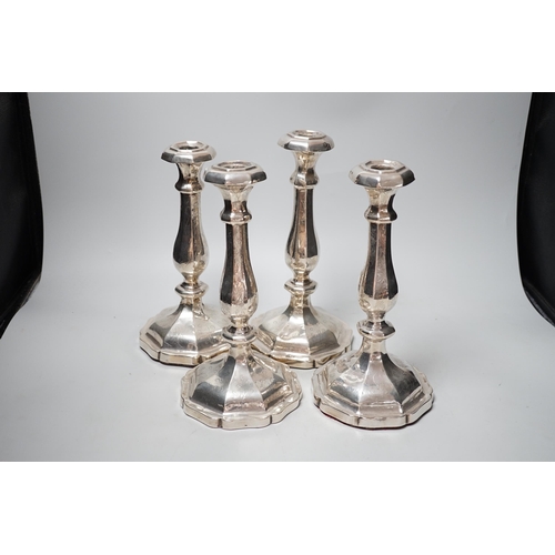 1803 - A set of four 19th century Austro-Hungarian white metal candlesticks, dated 1863, height 27.4cm, et ... 