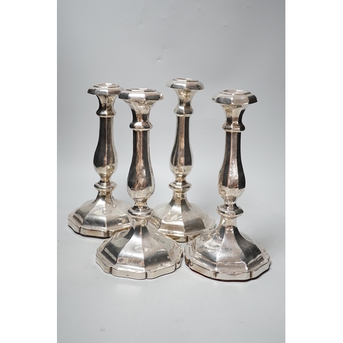 1803 - A set of four 19th century Austro-Hungarian white metal candlesticks, dated 1863, height 27.4cm, et ... 