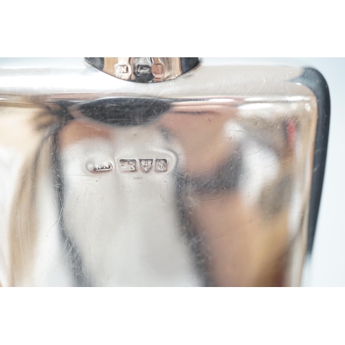 1813 - An Edwardian silver hip flask, Chester, 1905, 13.7cm, together with a white metal mounted glass scen... 