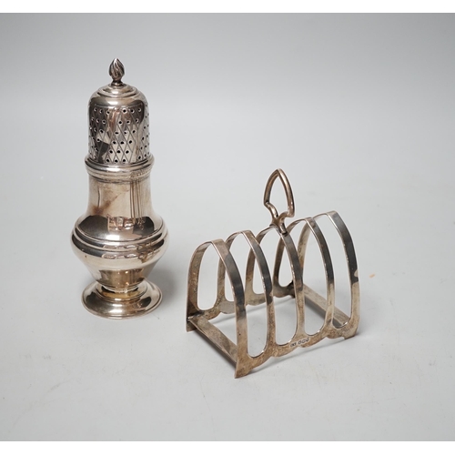 1831 - A modern silver sugar caster, 16.5cm and a George V silver toast rack, 8.7oz.