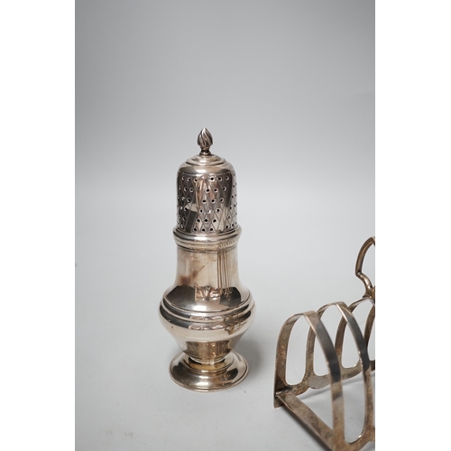 1831 - A modern silver sugar caster, 16.5cm and a George V silver toast rack, 8.7oz.