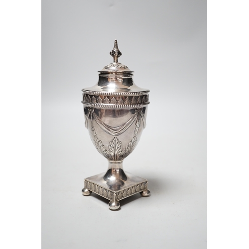 1847 - A George III silver vase and cover, with swag and fern decoration, on square base, with ball feet, R... 