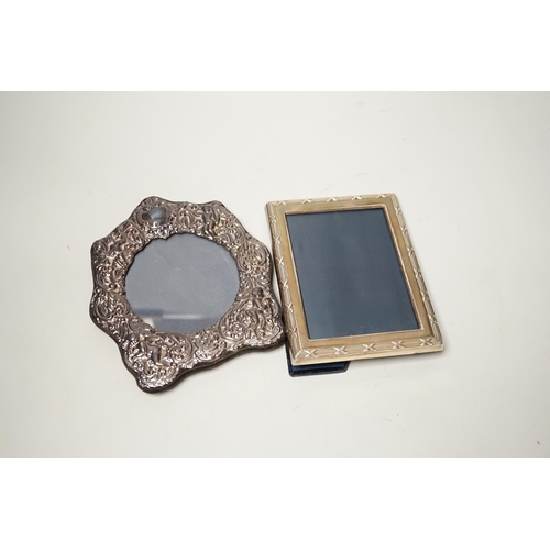 1865 - Two modern repousse silver mounted photograph frames, largest 17cm.