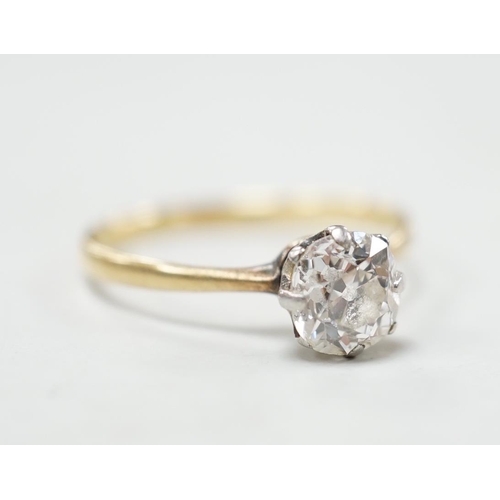 1879 - An 18ct, plat and solitaire diamond ring, size M/N, gross weight 1.8 grams, the stone measuring appr... 