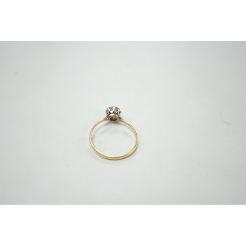 1879 - An 18ct, plat and solitaire diamond ring, size M/N, gross weight 1.8 grams, the stone measuring appr... 