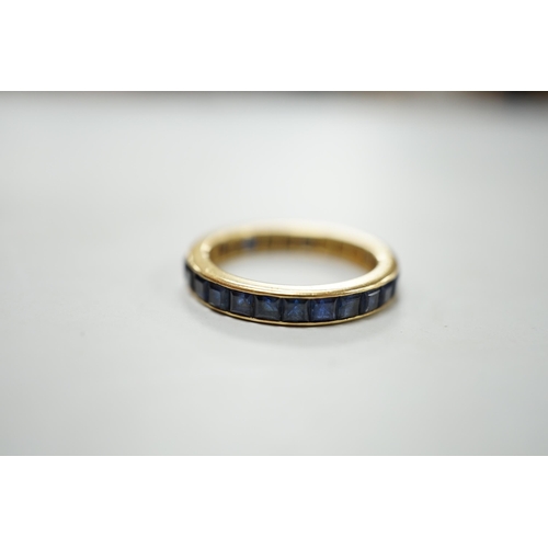 1880 - A yellow metal and sapphire set full eternity ring, size R, gross weight 4.6 grams.