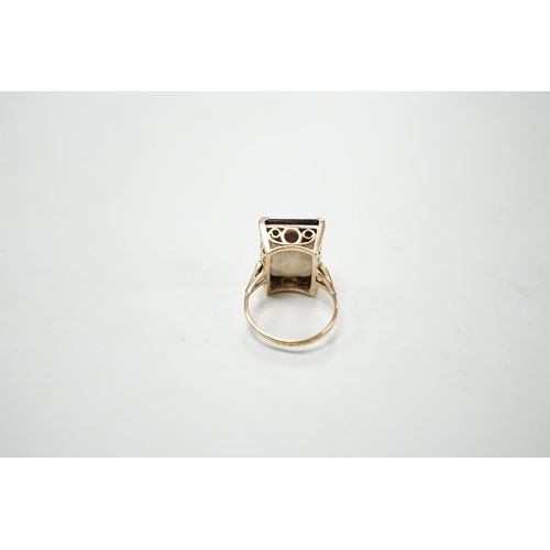 1897 - A 9ct gold and single stone smoky quartz set dress ring, size T, gross weight 8.5 grams.