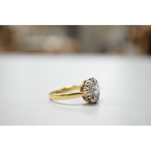 1903 - A yellow metal and nine stone diamond set cluster ring, size N, gross weight 5 grams, chip to centre... 