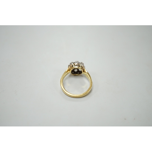 1903 - A yellow metal and nine stone diamond set cluster ring, size N, gross weight 5 grams, chip to centre... 