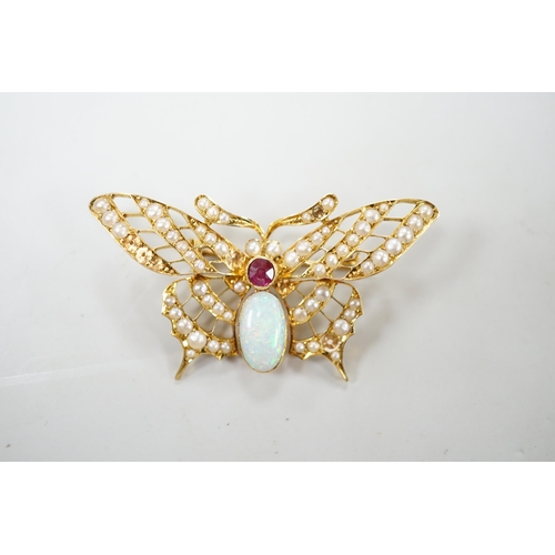 1905 - A yellow metal ruby, white opal and seed pearl cluster set bug brooch, width 48mm, gross weight 7 gr... 