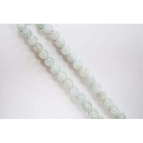 1906 - A single strand jadeite bead necklace, with 18k clasp, 43cm, gross weight 58.7 grams, with accompany... 