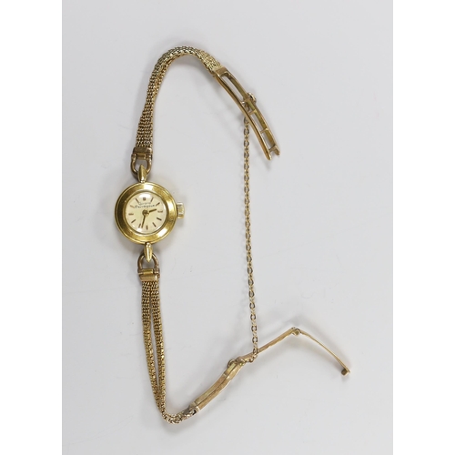 1918 - A lady's yellow metal Girard Perregaux manual wind wrist watch, on a 9ct twin strand bracelet, gross... 