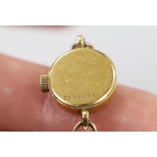 1918 - A lady's yellow metal Girard Perregaux manual wind wrist watch, on a 9ct twin strand bracelet, gross... 