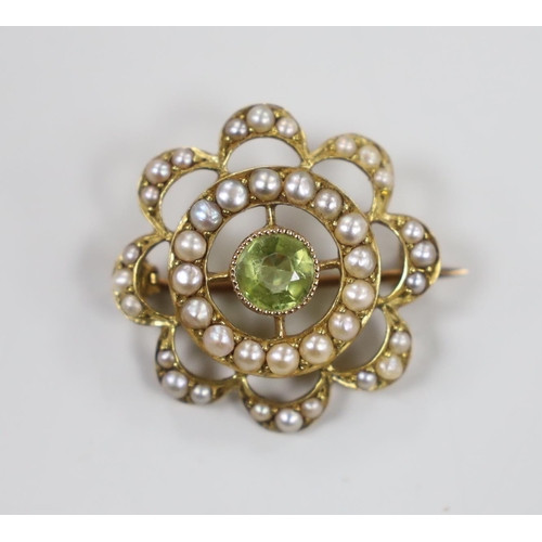 1926 - A late Victorian 15ct  peridot and seed pearl set cluster brooch, 21mm, gross weight 3 grams.