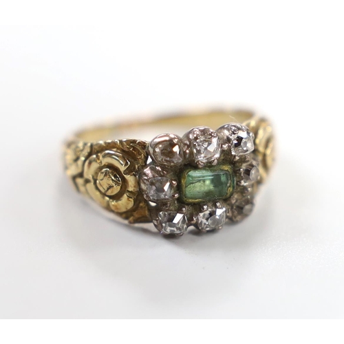 1930 - A 19th century yellow metal, foil backed emerald and diamond set rectangular cluster ring, with carv... 