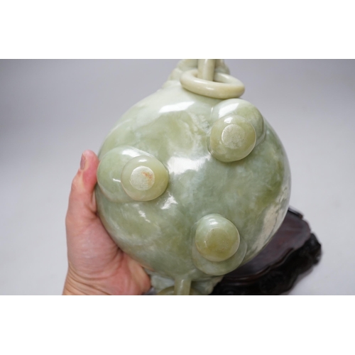 250 - A large Chinese bowenite jade censer and cover on carved hardwood stand, 21cm wide